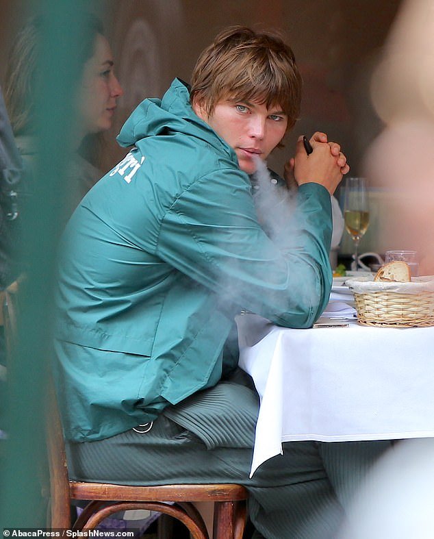 Chowing down: After sitting down to have a meal, Meadow left with a takeout bag of leftovers