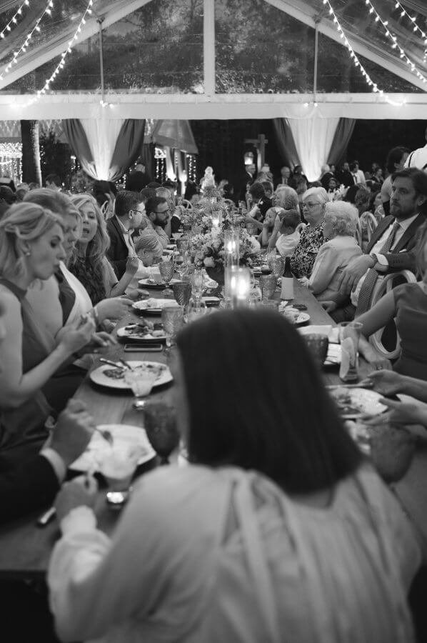 Long harvest tables at farm wedding