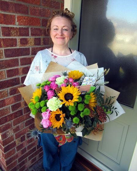 Danielle Wyatt with one of the bespoke bouquets. 